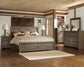 Juararo King Panel Bed with Mirrored Dresser, Chest and Nightstand