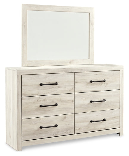 Cambeck King Upholstered Panel Bed with Mirrored Dresser