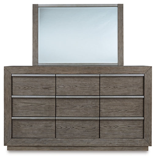 Anibecca Queen Upholstered Panel Bed with Mirrored Dresser